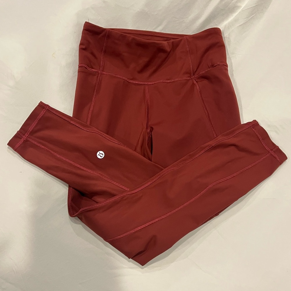 Two side pockets & one zippered back pocket. Only worn/washed once. Look new!